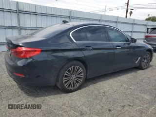 2018 BMW 5 Series 540i z VIN WBAJE5C54JG917667, wystawiony jako Copart lot #56655625 z przebiegiem 99 236 mil mil oraz Czysty tytuł • Clean title. Historia ofert i sprzedaży dostępna na DreamBid. Obrazek 3.
