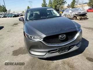 2020 Mazda CX-5 Touring with VIN JM3KFACM9L0815692, listed as a Copart auction lot 52431295 with 59,359 mi miles and Salvage Title. Bid and sale history available at DreamBid. Image 12.