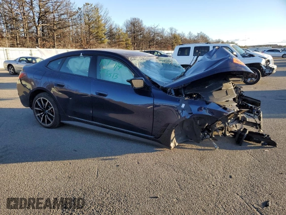 2023 BMW i4 M50 with VIN WBY33AW08PFP06513, listed as a Copart auction lot 87903685 with 0 mi miles and Salvage Title. Bid and sale history available at carsss.com. Image 4.