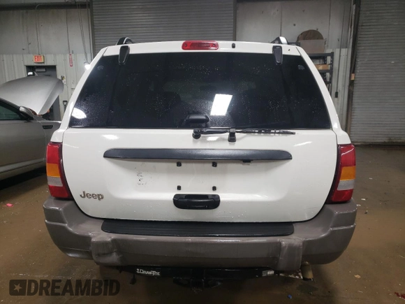 2004 Jeep Grand Cherokee Laredo with VIN 1J4GX48S64C114641, listed as a Copart auction lot 83894884 with 109,773 mi miles and Non repairable. Bid and sale history available at DreamBid. Image 6.