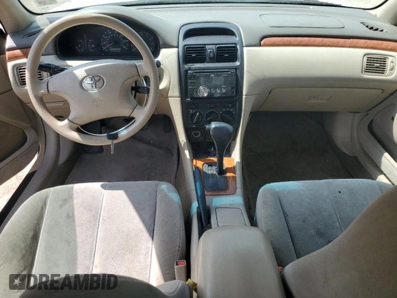 2002 Toyota Solara SE z VIN 2T1CE22P42C005554, wystawiony jako Copart lot #57756005 z przebiegiem 317 340 mil mil oraz Szkoda całkowita • Salvage title. Historia ofert i sprzedaży dostępna na DreamBid. Obrazek 8.