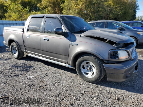 2002 Ford F-150 Harley Davidson with VIN 1FTRW07362KC77880, listed as a Copart auction lot 75259594 with 103,591 mi miles and Salvage Title. Bid and sale history available at carsss.com. Image 4.