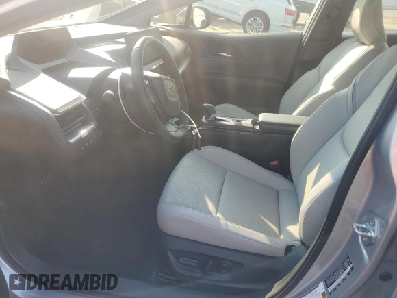 2024 Toyota Prius LE with VIN JTDADABU8R3020720, listed as a Copart auction lot 60815005 with 2,594 mi miles and Salvage title. Bid and sale history available at DreamBid. Image 7.