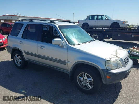 1999 Honda CR-V EX with VIN JHLRD1860XC056641, listed as a IAAI auction lot 42018329 with 321,707 mi miles. Bid and sale history available at carsss.com. Image 1.