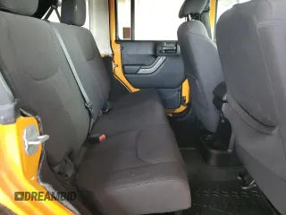 2013 Jeep Wrangler Unlimited Sport z VIN 1C4BJWDGXDL556580, wystawiony jako Copart lot #55477185 z przebiegiem 71 044 mil mil oraz Szkoda całkowita • Salvage title. Historia ofert i sprzedaży dostępna na DreamBid. Obrazek 10.