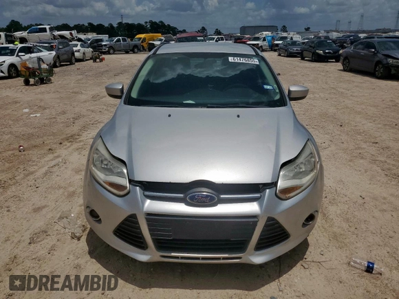 2012 Ford Focus SE with VIN 1FAHP3F29CL287498, listed as a Copart auction lot 61476855 with 139,801 mi miles and Salvage title. Bid and sale history available at DreamBid. Image 5.