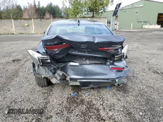 2023 Honda Civic Sedan Sport with VIN 2HGFE2F52PH517298, listed as a Copart auction lot 51676335 with 21,427 mi miles and Salvage Title. Bid and sale history available at carsss.com. Image 6.