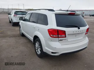 2014 Dodge Journey SXT z VIN 3C4PDCBB9ET222226, wystawiony jako IAAI lot #42056579 z przebiegiem 105 139 mil mil oraz . Historia ofert i sprzedaży dostępna na DreamBid. Obrazek 3.