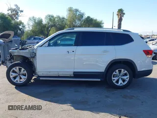 2018 Volkswagen Atlas SE с VIN 1V2DR2CA9JC551484, выставлен на аукционе IAAI как лот 41262713 с пробегом 59 054 миль миль и . История ставок и продаж доступна на DreamBid. Изображение 15.