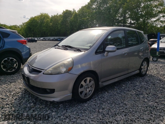 2007 Honda Fit Sport z VIN JHMGD37677S001013, wystawiony jako Copart lot #58792605 z przebiegiem 157 960 mil mil oraz Czysty tytuł • Clean title. Historia ofert i sprzedaży dostępna na DreamBid. Obrazek 1.
