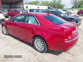 2011 Cadillac CTS with VIN 1G6DC5EY2B0143073, listed as a IAAI auction lot 42322497 with 133,992 mi miles and . Bid and sale history available at DreamBid. Image 3.