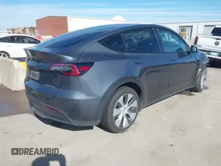 2023 Tesla Model Y Long Range with VIN 7SAYGDEE1PA060410, listed as a IAAI auction lot 41357943 with 19,072 mi miles. Bid and sale history available at carsss.com. Image 4.
