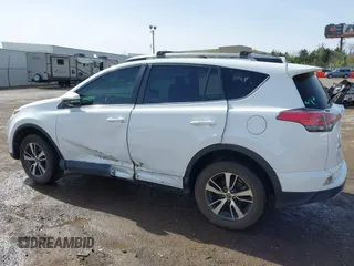 2017 Toyota RAV4 XLE with VIN 2T3WFREV3HW324973, listed as a IAAI auction lot 41778641 with 113,617 mi miles and . Bid and sale history available at DreamBid. Image 14.