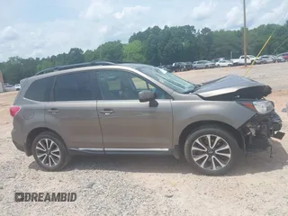 2017 Subaru Forester Touring with VIN JF2SJGWCXHH558789, listed as a IAAI auction lot 42518698 with 112,294 mi miles and . Bid and sale history available at DreamBid. Image 13.