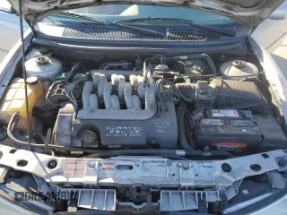 1998 Ford Contour z VIN 3FAFP66L8WM142974, wystawiony jako Copart lot #42175265 z przebiegiem 195 277 mil mil oraz Szkoda całkowita • Salvage title. Historia ofert i sprzedaży dostępna na DreamBid. Obrazek 12.