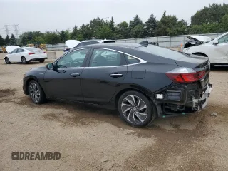 2022 Honda Insight Touring with VIN 19XZE4F94NE011720, listed as a Copart auction lot 60856475 with 19,512 mi miles and Salvage title. Bid and sale history available at DreamBid. Image 2.