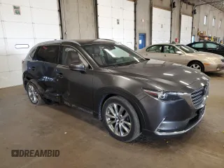 2016 Mazda CX-9 Signature with VIN JM3TCBEY6G0109918, listed as a Copart auction lot 59388185 with 153,626 mi miles and Salvage title. Bid and sale history available at DreamBid. Image 4.