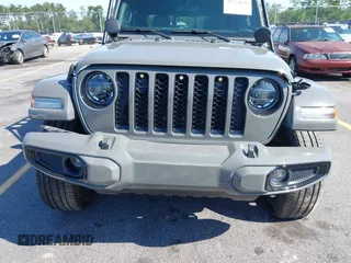 2022 Jeep Gladiator High Altitude with VIN 1C6HJTFG6NL152173, listed as a IAAI auction lot 42524638 with 17,148 mi miles and . Bid and sale history available at DreamBid. Image 6.