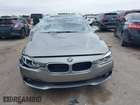 2018 BMW 3 Series 320i with VIN WBA8E1G51JNU92342, listed as a IAAI auction lot 41641934 with 27,477 mi miles. Bid and sale history available at carsss.com. Image 12.
