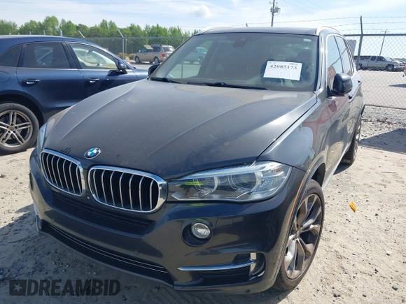 2014 BMW X5 xDrive35d with VIN 5UXKS4C57E0J93982, listed as a IAAI auction lot 42085173 with 169,908 mi miles. Bid and sale history available at carsss.com. Image 21.
