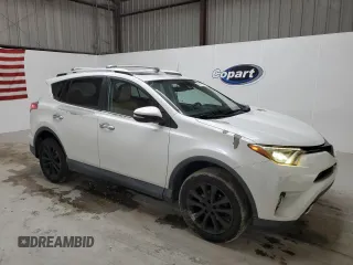 2016 Toyota RAV4 Limited with VIN 2T3YFREV3GW293988, listed as a Copart auction lot 58768425 with 140,214 mi miles and Clean title. Bid and sale history available at DreamBid. Image 4.