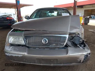 2003 Mercury Grand Marquis LS Premium with VIN 2MEFM75W23X613004, listed as a IAAI auction lot 41974625 with 151,023 mi miles and . Bid and sale history available at DreamBid. Image 12.