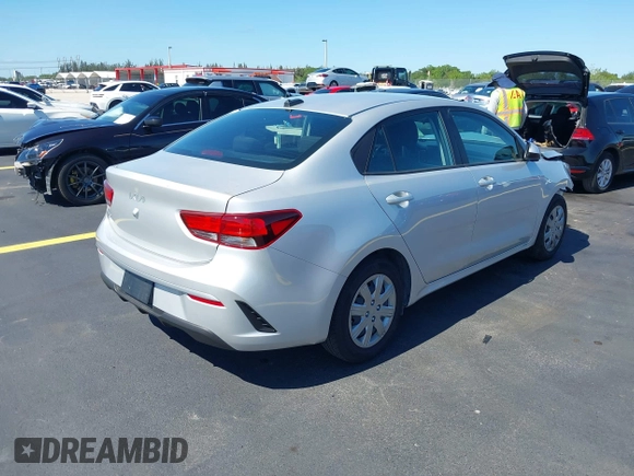 2023 Kia Rio S z VIN 3KPA24AD4PE592446, wystawiony jako IAAI lot #42244022 z przebiegiem 13 759 mil mil oraz . Historia ofert i sprzedaży dostępna na DreamBid. Obrazek 4.