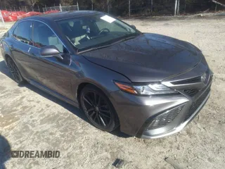 2022 Toyota Camry TRD with VIN 4T1KZ1AK9NU060715, listed as a IAAI auction lot 41283800 with 49,655 mi miles and . Bid and sale history available at DreamBid. Image 1.