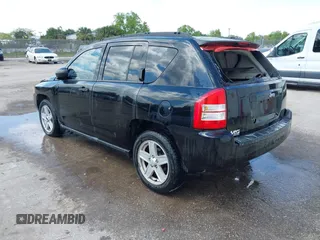 2007 Jeep Compass Sport with VIN 1J8FT47W57D119595, listed as a IAAI auction lot 41782027 with 223,203 mi miles. Bid and sale history available at carsss.com. Image 3.