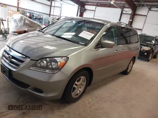 2007 Honda Odyssey EX-L with VIN 5FNRL38737B095747, listed as a IAAI auction lot 42126000 with 178,779 mi miles. Bid and sale history available at carsss.com. Image 2.