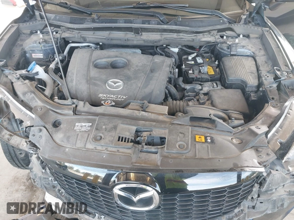 2014 Mazda CX-5 Grand Touring with VIN JM3KE2DY6E0394172, listed as a IAAI auction lot 41698468 with 89,554 mi miles. Bid and sale history available at carsss.com. Image 10.