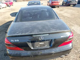 2005 Mercedes-Benz SL 55 AMG with VIN WDBSK74F75F099722, listed as a IAAI auction lot 41308261 with 60,134 mi miles and . Bid and sale history available at DreamBid. Image 16.
