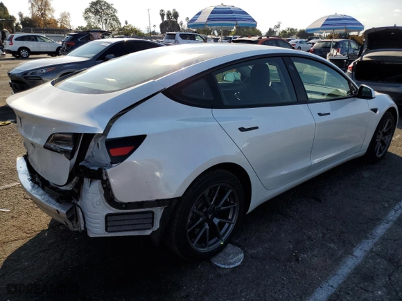 2021 Tesla Model 3 Standard Range Plus with VIN 5YJ3E1EA8MF029615, listed as a Copart auction lot 88350285 with 60,244 mi miles and Salvage Title. Bid and sale history available at carsss.com. Image 3.