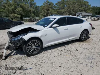 2021 Cadillac CT5 Luxury z VIN 1G6DW5RKXM0112301, wystawiony jako Copart lot #52497035 z przebiegiem 69 261 mil mil oraz Szkody całkowita. Historia ofert i sprzedaży dostępna na DreamBid. Obrazek 1.