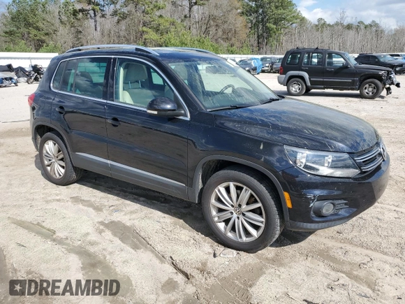2012 Volkswagen Tiguan SE with VIN WVGAV7AX1CW610349, listed as a Copart auction lot 49250985 with 139,718 mi miles and Salvage Title. Bid and sale history available at DreamBid. Image 4.