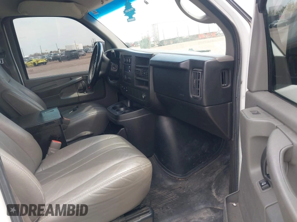 2012 Chevrolet Express Cargo Van with VIN 1GCWGFCA7C1121989, listed as a IAAI auction lot 42118853 with 214,478 mi miles. Bid and sale history available at carsss.com. Image 5.