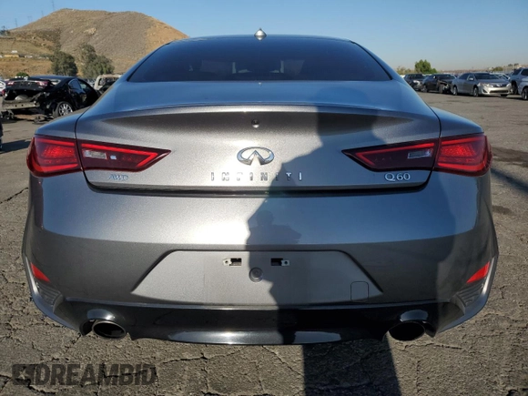 2018 Infiniti Q60 Luxe with VIN JN1EV7EL8JM390331, listed as a Copart auction lot 57862095 with 54,676 mi miles and Salvage title. Bid and sale history available at DreamBid. Image 6.