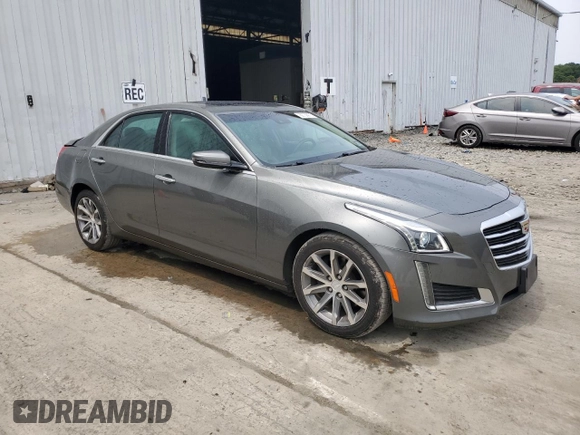 2016 Cadillac CTS Luxury Collection AWD with VIN 1G6AX5SX0G0112110, listed as a Copart auction lot 60739975 with 63,722 mi miles and Salvage title. Bid and sale history available at DreamBid. Image 4.