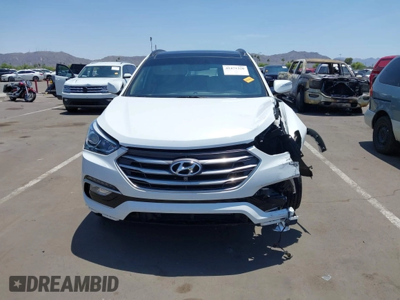 2018 Hyundai Santa Fe 2.4L with VIN 5NMZU3LB4JH054123, listed as a IAAI auction lot 42471320 with 53,464 mi miles and . Bid and sale history available at DreamBid. Image 12.