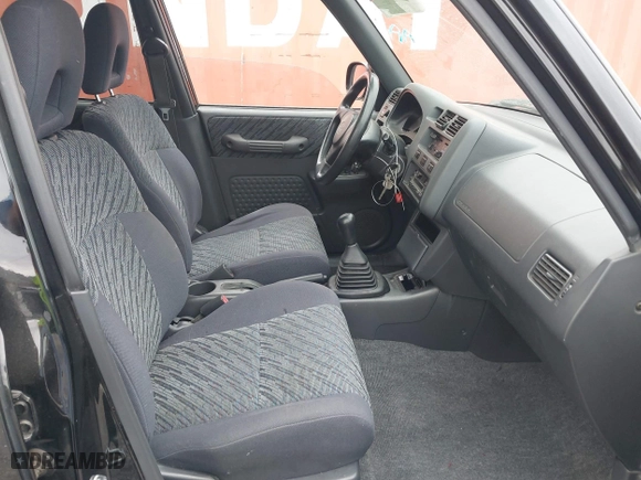 1999 Toyota RAV4 with VIN JT3HP10V5X7120186, listed as a IAAI auction lot 41909578 with 257,200 mi miles. Bid and sale history available at carsss.com. Image 5.
