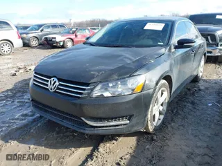 2012 Volkswagen Passat SE w/Sunroof with VIN 1VWBP7A31CC077742, listed as a IAAI auction lot 41489979 with 152,508 mi miles. Bid and sale history available at carsss.com. Image 2.
