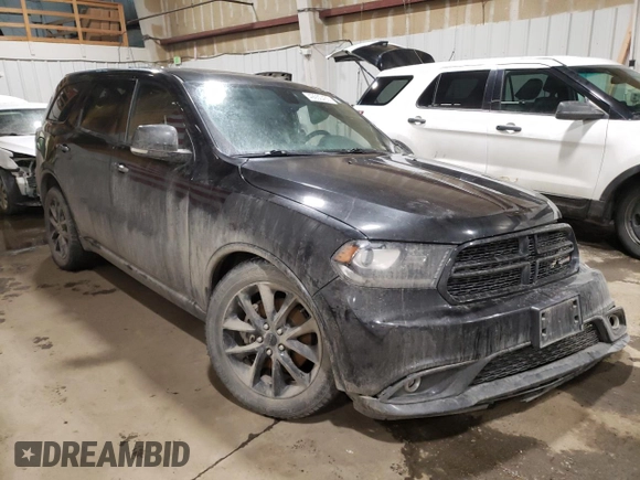 2014 Dodge Durango R/T with VIN 1C4SDJCT9EC977300, listed as a Copart auction lot 49930435 with 165,569 mi miles and Salvage title. Bid and sale history available at DreamBid. Image 4.