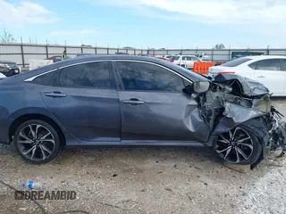 2019 Honda Civic Si z VIN 2HGFC1E55KH701354, wystawiony jako IAAI lot #42115508 z przebiegiem Nie podano mil oraz . Historia ofert i sprzedaży dostępna na DreamBid. Obrazek 12.