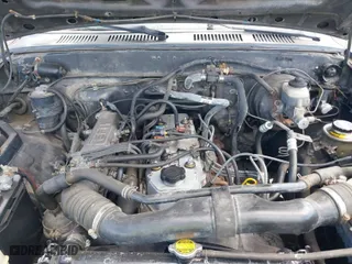 1991 Toyota 2WD Pickups DX with VIN JT4RN93P5M5033297, listed as a IAAI auction lot 41870173 with 202,064 mi miles. Bid and sale history available at carsss.com. Image 10.