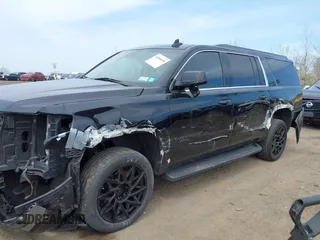 2017 Chevrolet Suburban LT with VIN 1GNSKHKCXHR194365, listed as a IAAI auction lot 42060690 with 213,424 mi miles and . Bid and sale history available at DreamBid. Image 6.