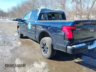 2023 Ford F-150 Lightning Pro with VIN 1FTVW1EL7PWG07081, listed as a IAAI auction lot 38702102 with 9,976 mi miles and . Bid and sale history available at DreamBid. Image 3.