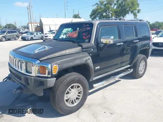 2007 Hummer H3 SUV with VIN 5GTDN13E878233953, listed as a IAAI auction lot 42012596 with 232,919 mi miles. Bid and sale history available at carsss.com. Image 2.