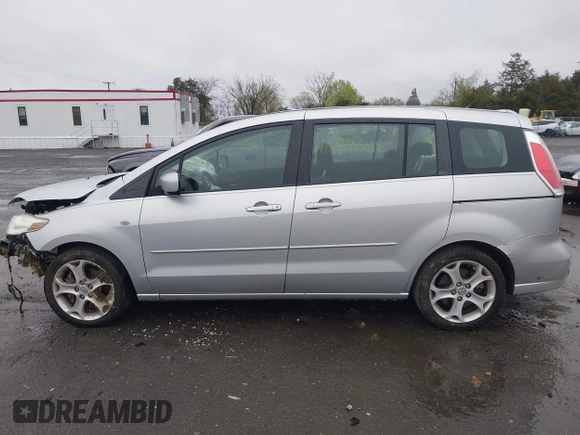 2009 Mazda Mazda5 Sport with VIN JM1CR293490334170, listed as a IAAI auction lot 41972688 with 125,137 mi miles. Bid and sale history available at carsss.com. Image 14.