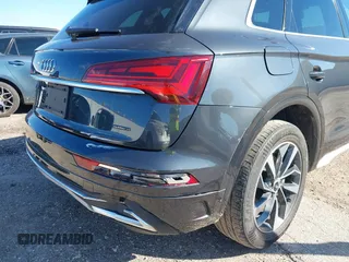 2021 Audi Q5 Premium Plus z VIN WA1BAAFY6M2013249, wystawiony jako IAAI lot #38681569 z przebiegiem 68 694 mil mil oraz . Historia ofert i sprzedaży dostępna na DreamBid. Obrazek 6.