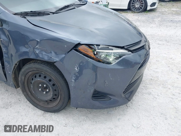2019 Toyota Corolla L z VIN 5YFBURHE1KP947817, wystawiony jako IAAI lot #41959566 z przebiegiem 128 574 mil mil oraz . Historia ofert i sprzedaży dostępna na DreamBid. Obrazek 6.